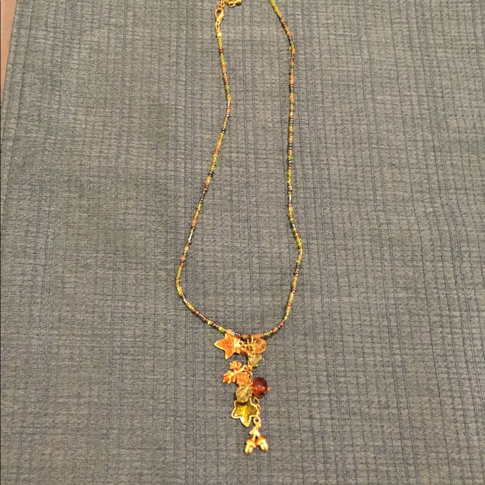 Fall charm pendent on beaded necklace